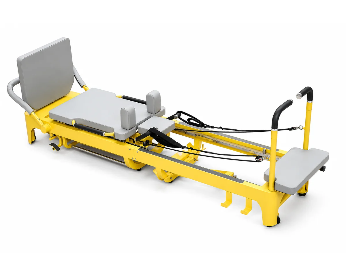 Yellow steel Mega Core Reformer CP114 for commercial Pilates studios