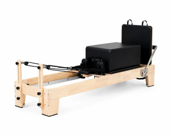 CP152 oak pilates reformer side front view