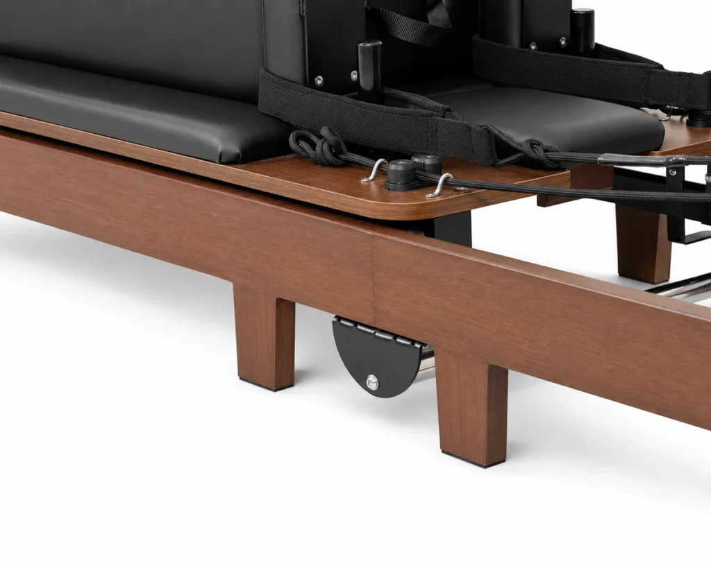 cp208-walnut-finish-reformer-frame-rail-detail