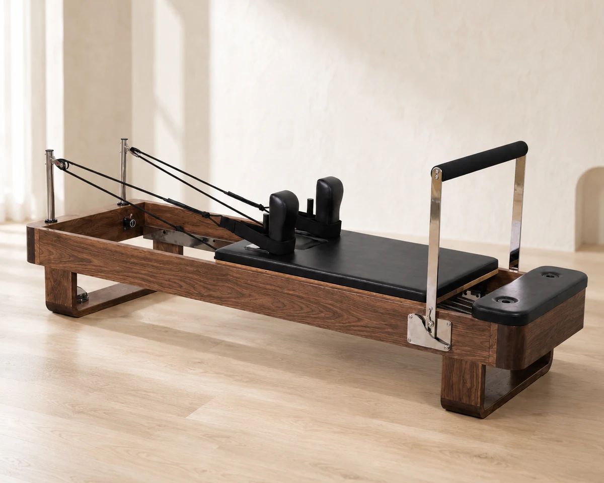 CP168 maple Pilates reformer with walnut color finish in studio