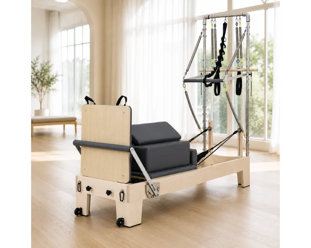 CP301 Maple Reformer with Half Tower in Bright Studio maple Pilates reformer with half tower CP301 in a bright studio