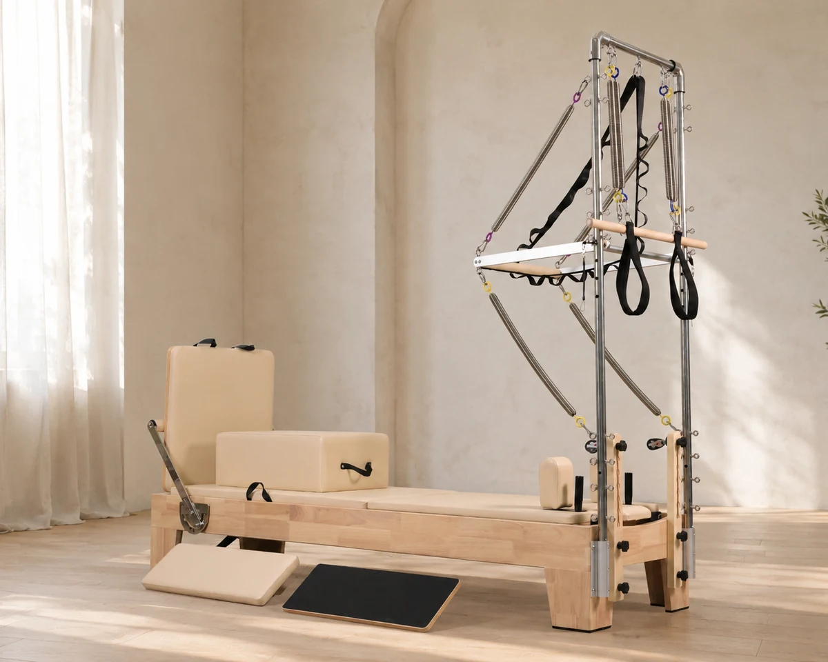 CP302 oak Pilates reformer with half tower in a professional studio