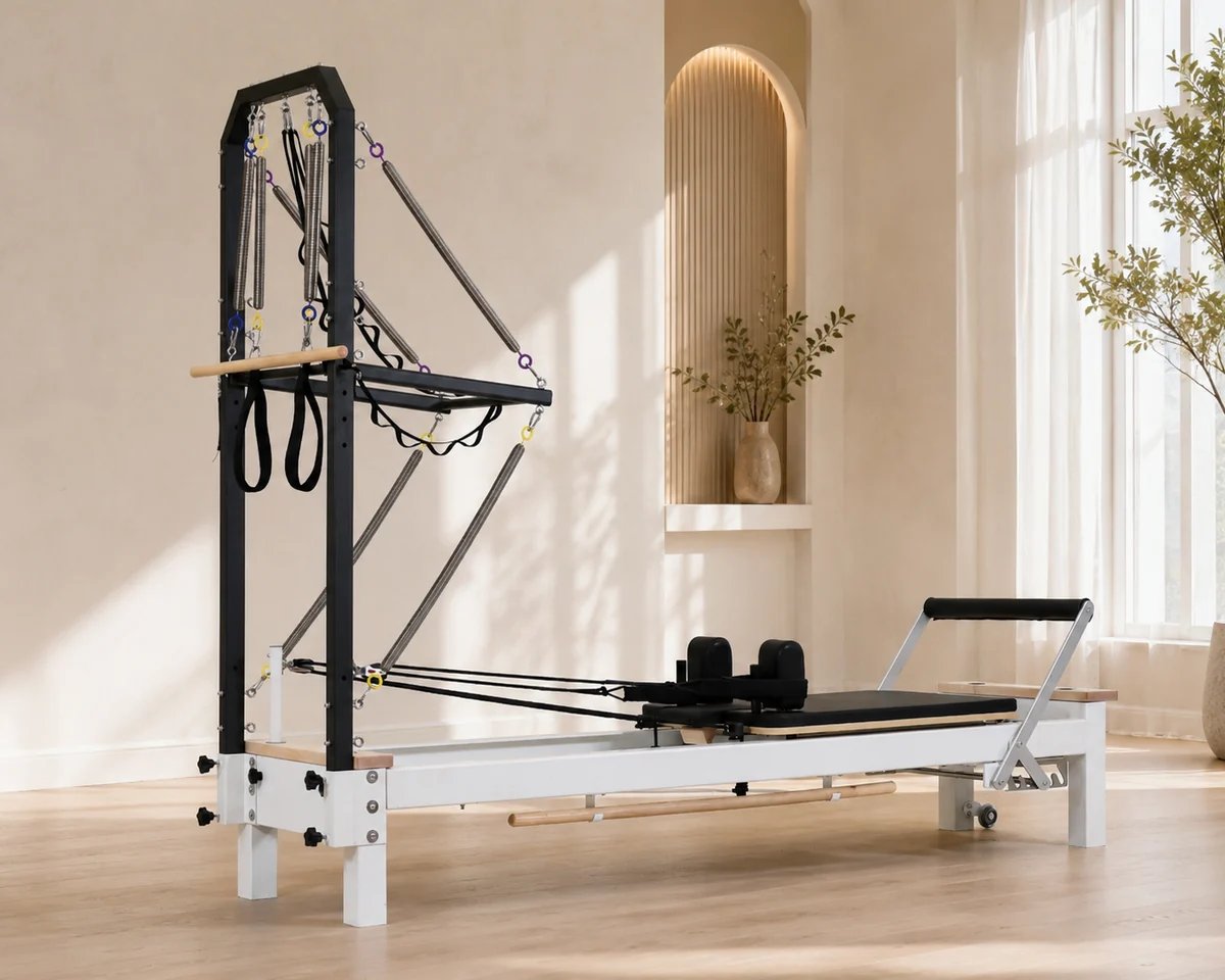 CP310 aluminum Pilates reformer with half tower in studio
