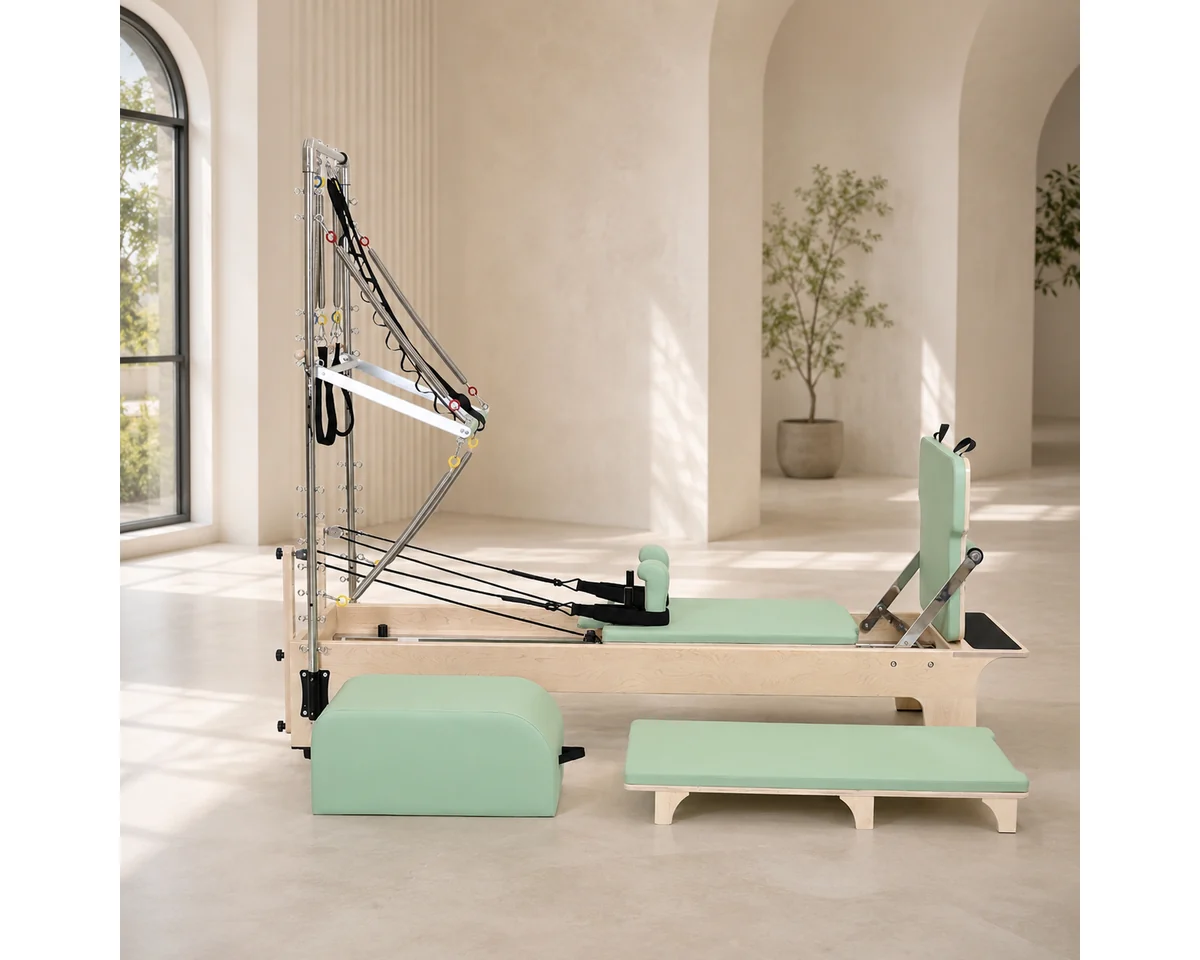 CP312 maple Pilates tower reformer in professional studio