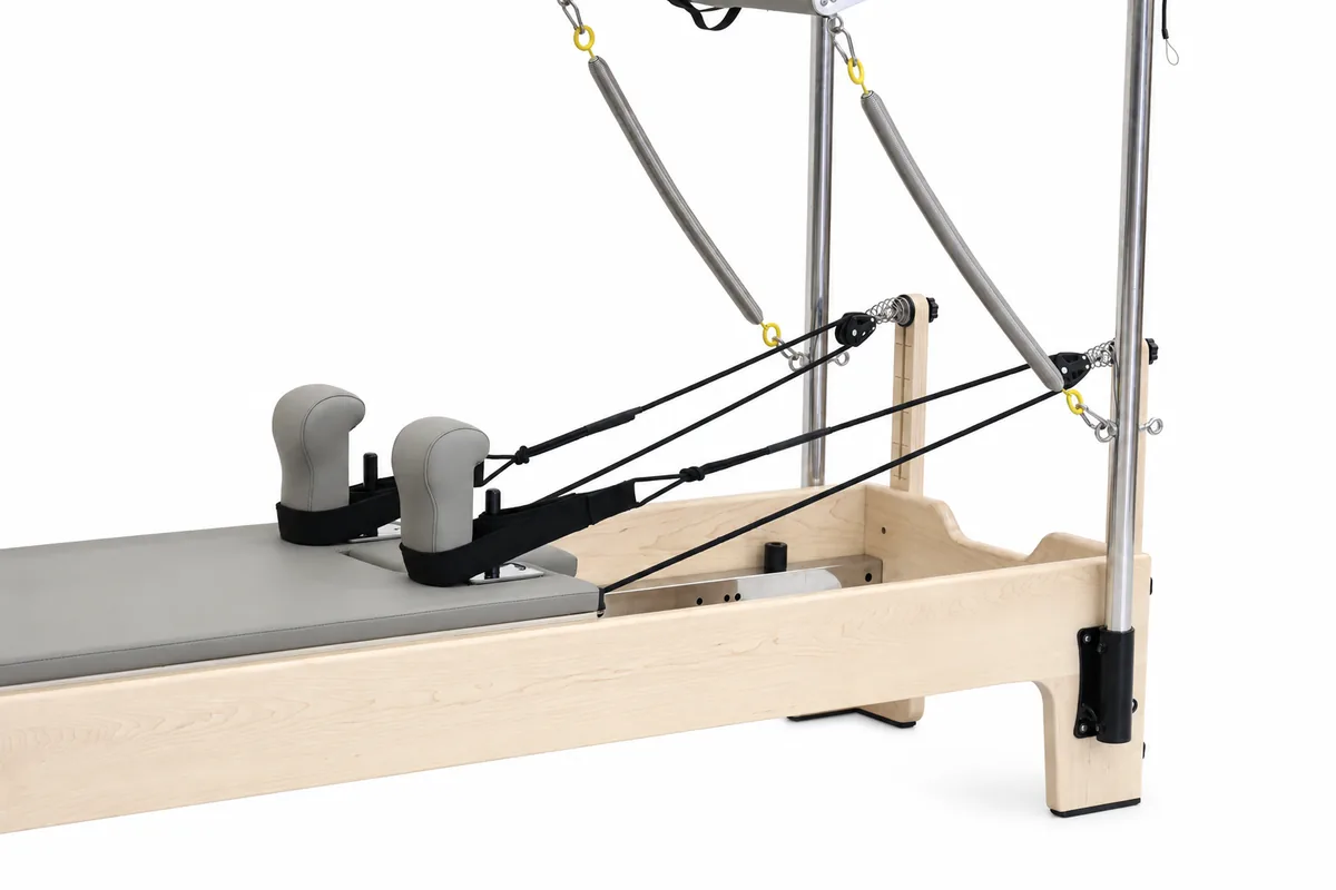New maple full tower Pilates reformer angle view