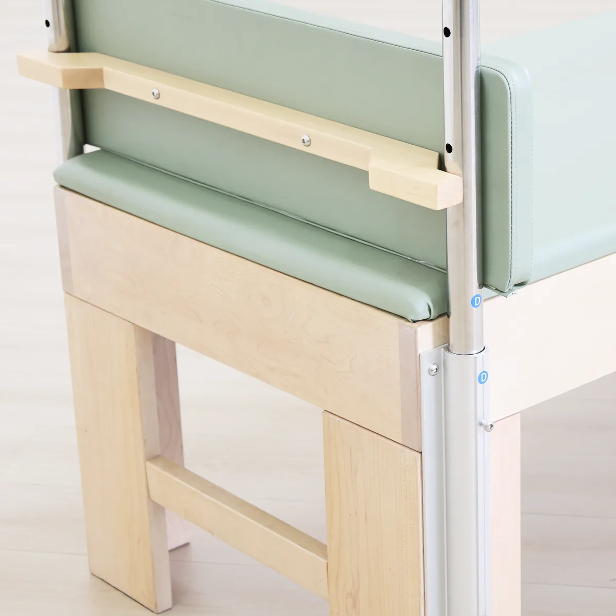 CP341 maple Cadillac trapeze table angle view